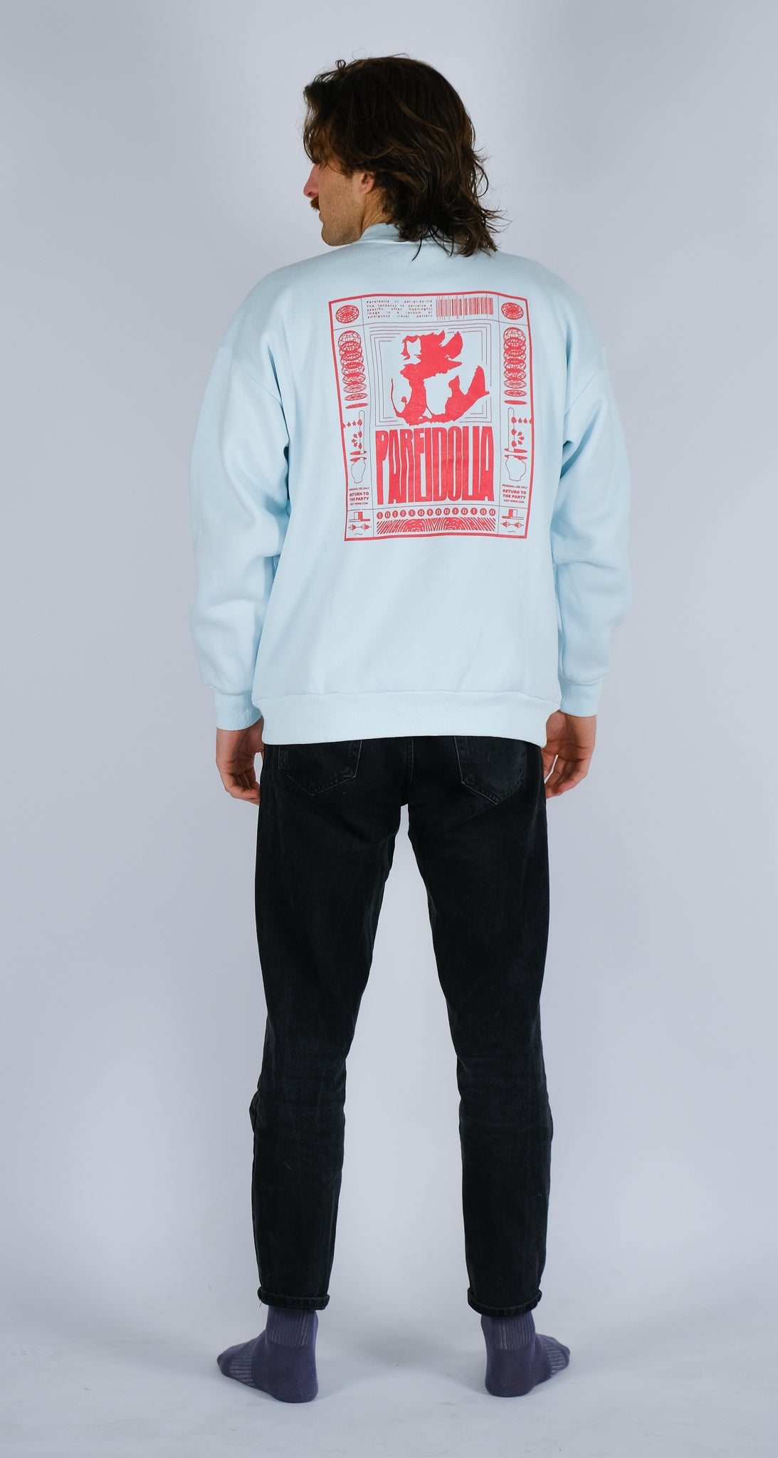 back of model 1 wearing ice blue sweat