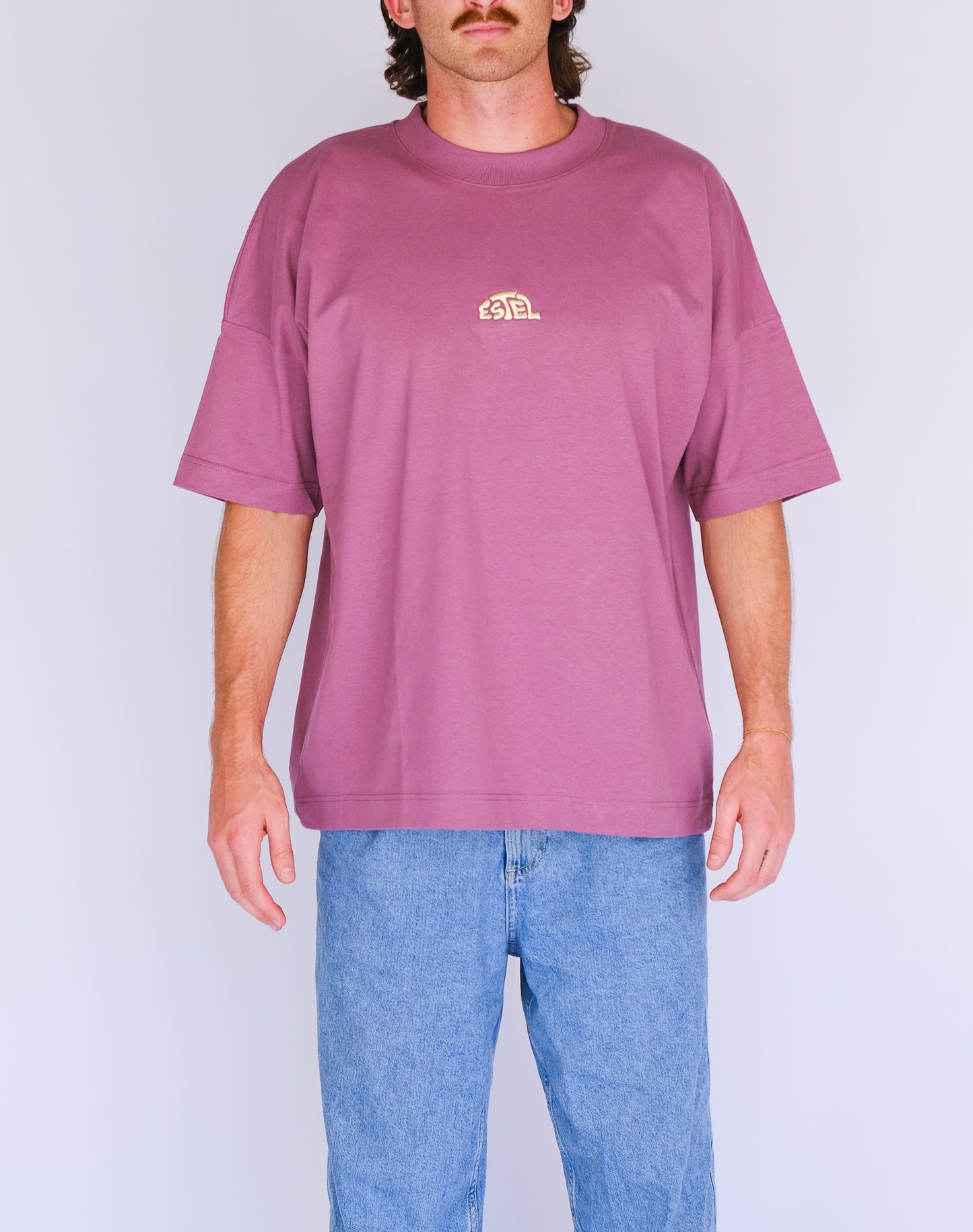 Model 1 wearing Mauve Box fit tee