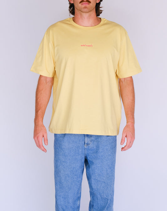 Model 1 wearing Banana supply embroidery tee